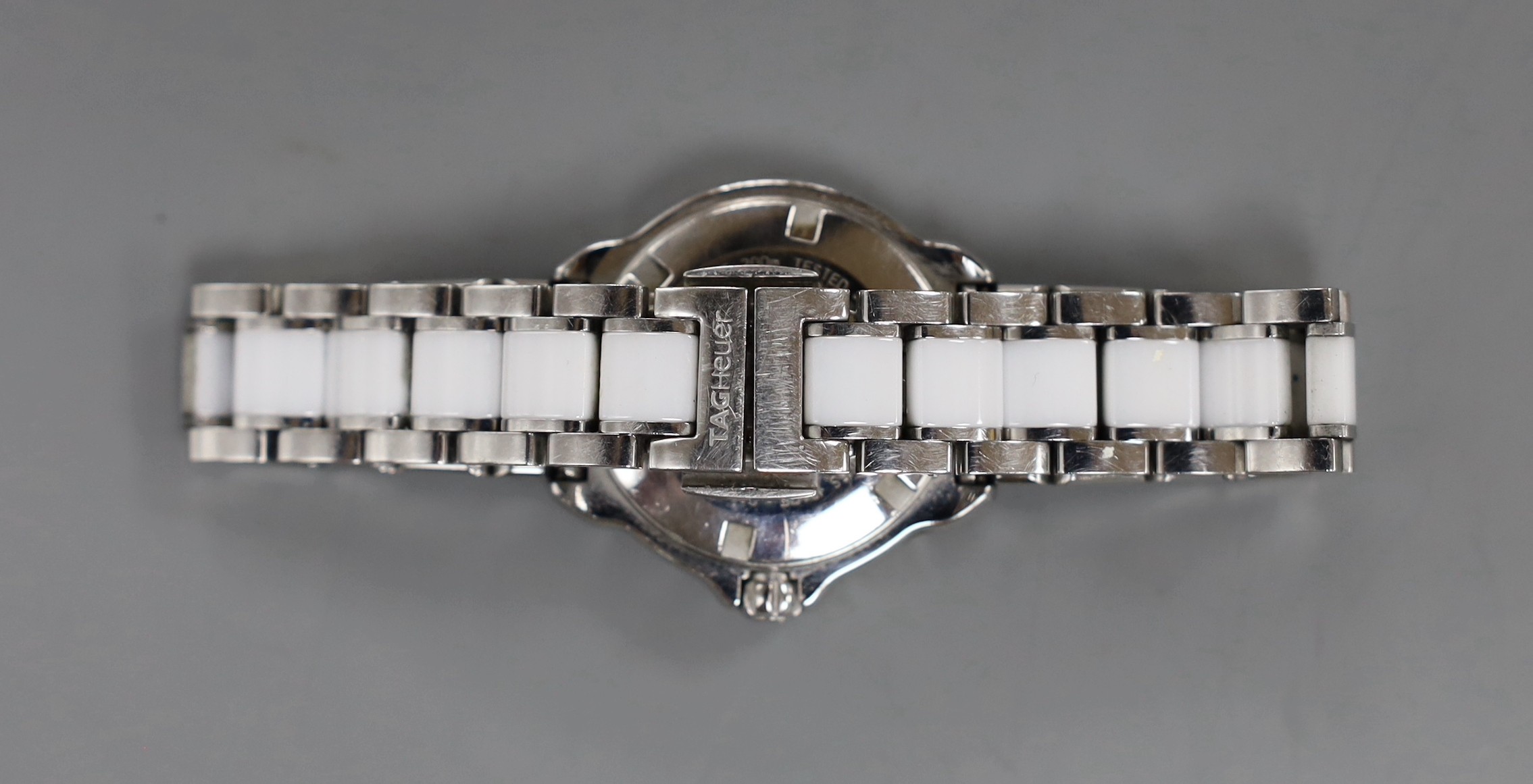 A lady's Tag Heuer Formula One quartz wristwatch (with box and receipt).